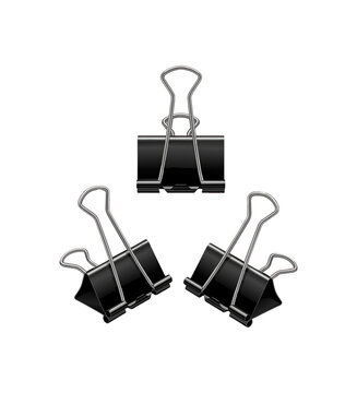 Three binder clips arranged on a white surface office supplies.