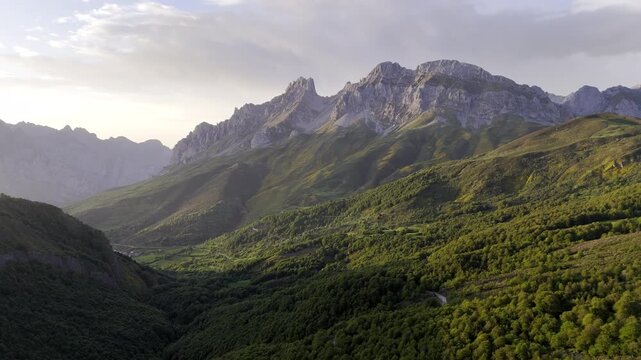 Picos de Europa central massif aerial view with dramatic evening lighting. HDR drone video of epic limestone mountain peaks in the Urrieles massif of Spain&rsquo;s Picos de Europa near Puerto de Pandetrave.