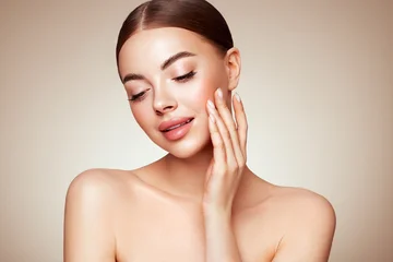 Portrait beautiful young woman with clean fresh skin. Model with healthy skin, close up portrait. Cosmetology, beauty and spa © Oleg Gekman