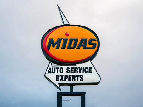 Rome, NY - Jun 7, 2026: Roadside Midas Auto Service Experts pole sign, representing Midas International LLC under TBC Corporation, a global automotive service brand 