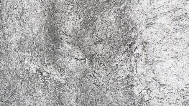 Macro detail texture of a rustic style raw plaster wall surface