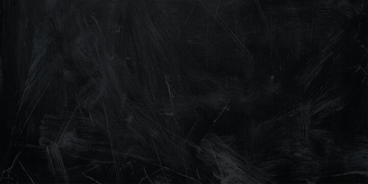 Dark scratched blackboard background with white chalk marks texture