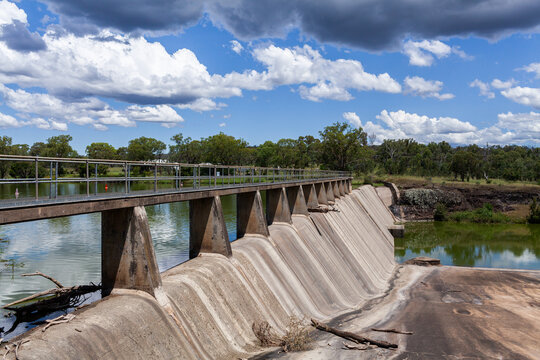 concrete dam wall at Lake Inverell on sunny summer day