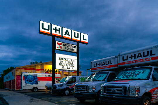 Rome, NY - Jun 7, 2026: Night view of U‑Haul rental and storage facility, part of U‑Haul International Inc., a national moving‑equipment and self‑storage company founded in 1945 with 23,000+ locations