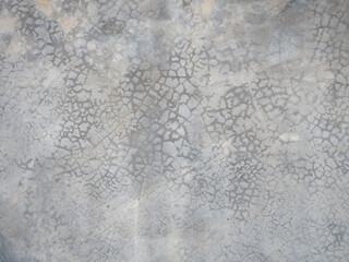 Fototapeta premium Historic pastel faded gray grunge stucco wall for background.