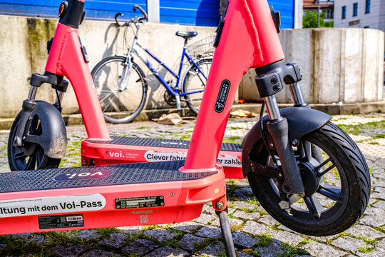 Munich, Germany - August 6: typical electro scooter at a sidewalk in munich on August 6, 2025