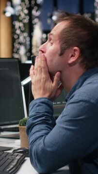 Vertical composition showing stressed admin relieved after managing to automate app development using AI scripts. Worried IT expert pleased after leveraging AI.