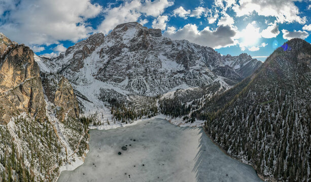 Frozen Lake Braies in Winter with Snowy Dolomites, South Tyrol, Italy
