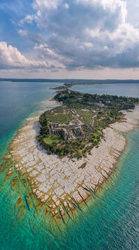 Aerial view over Archaeological site of Grotte di Catullo in Garda lake, Italy