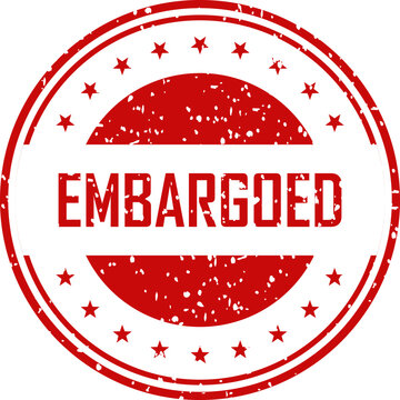Red embargoed stamp with stars and circle border