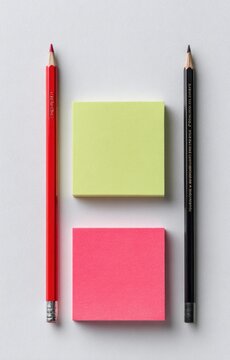 Red and black pencils frame vibrant neon sticky notes on white