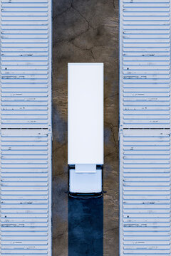 3D aerial freight lane with white truck and container rows