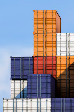 3D container stack skyline with orange blue cargo blocks