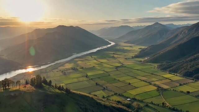 Aerial photography of the sunrise over mountains, rivers, fields and magnificent sunrise over mountains and rivers