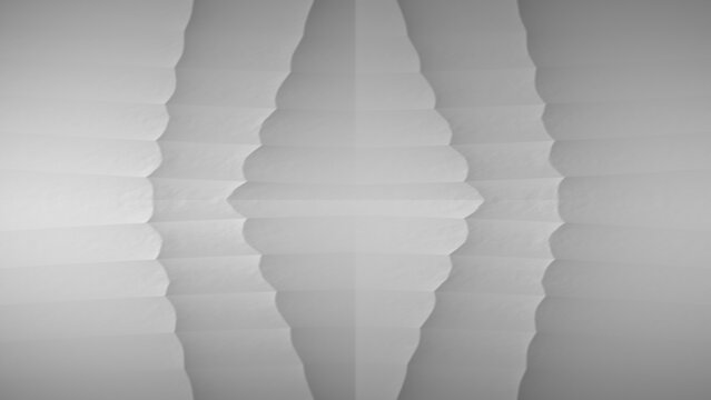 Abstract background features symmetrical white paper folds creating a sharp geometric structure.