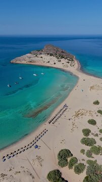 Discover the breathtaking Simos Beach on Elafonisos Island. With crystal-clear waters and soft sands, this paradise offers a perfect escape for relaxation and adventure under the sun.