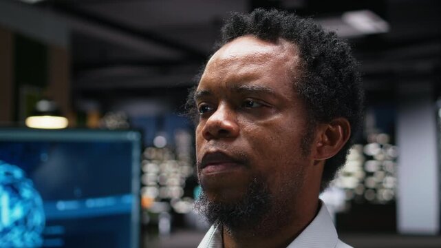 Close up of technician in office developing complex machine learning algorithms simulating human brain thought processes. man deploys AI tools, performing quality assurance for coding workflows.