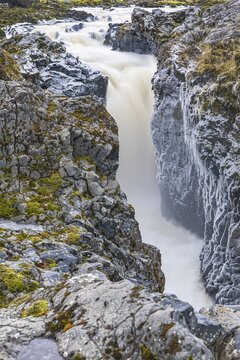 Rushing stream plunges into a narrow gorge, Fjallabak Nature Reserve, Sudurland, Iceland
