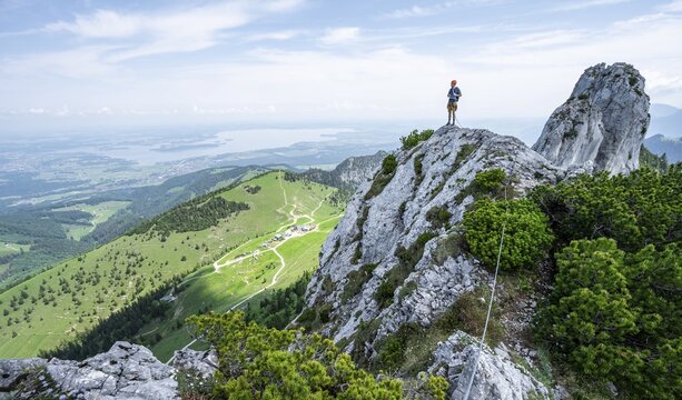 Climber on a climbing tour, climber on a mountain ridge, alpine climbing, crossing the Kampenwand, Chiemgau, Bavaria, Germany