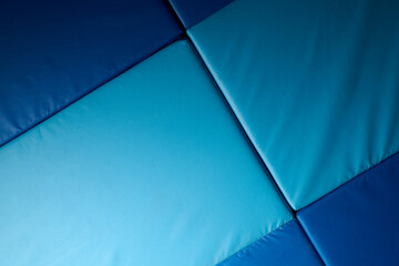 Naklejka premium Close up of a blue mat in a gym