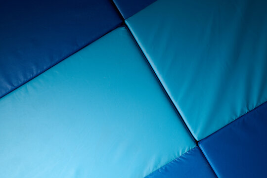 Close up of a blue mat in a gym