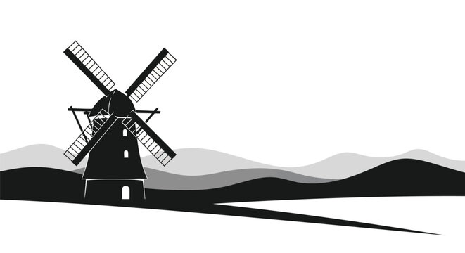Black windmill on a hill