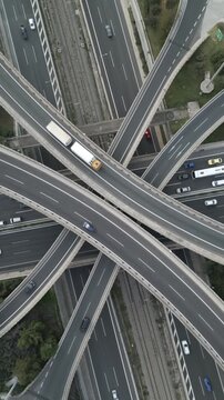 Vertical Aerial View of Highway Interchange and Traffic at Dusk