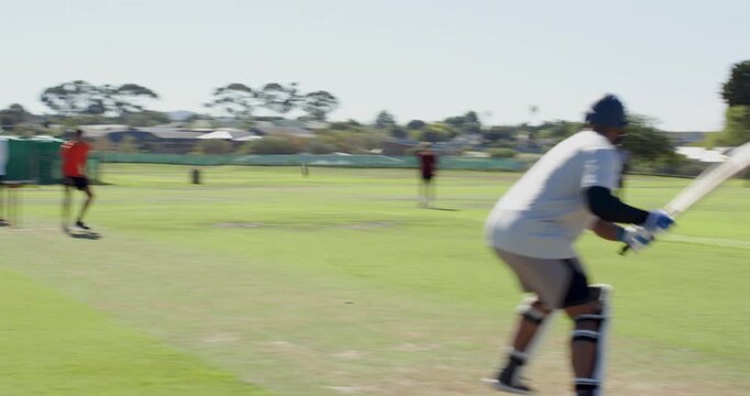 Diverse cricketers responding to bowler releasing ball, blocking, sprinting one run at crease