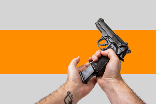 First Person Perspective of Hands Reloading a Semi Automatic Pistol Magazine, Isolated Dynamic Background