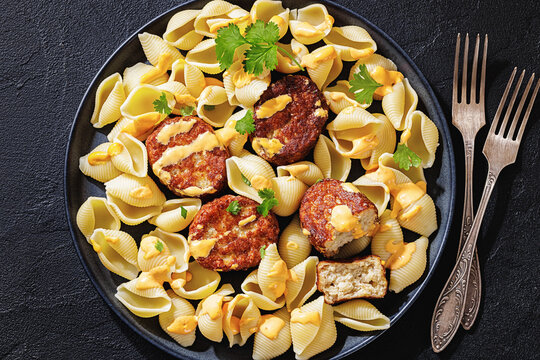 Shell Pasta And Meat Patties on a Plate