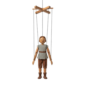 A wooden marionette puppet with articulated limbs and a control cross, standing on a transparent background. The puppet is dressed in a striped shirt and shorts.