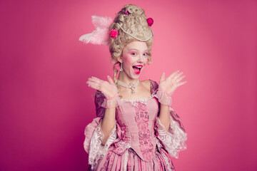 Fototapeta premium Photo of shock surprise lady princess feel impressed wearing festive antique style dress isolated pink color background