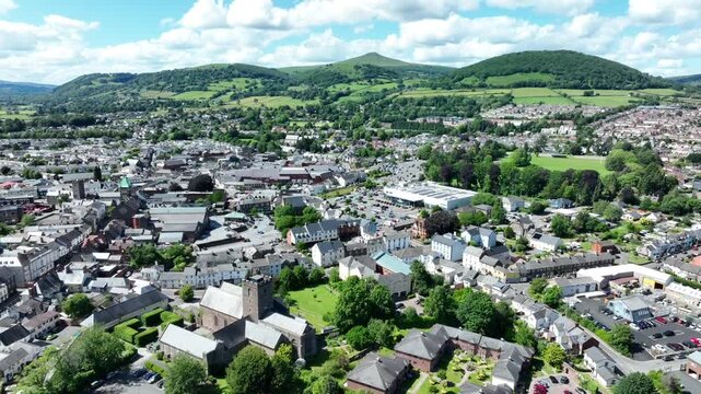 Editorial ABERGAVENNY, UK - JUNE 08, 2026: Drone view of Abergavenny town and Sugarloaf mountain in South Wales