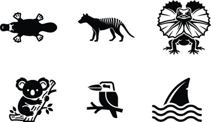 Black silhouettes of various Australian animals and a shark fin  wildlife icons © saidur