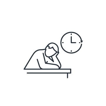 Man sitting at desk looking bored with clock in background.
