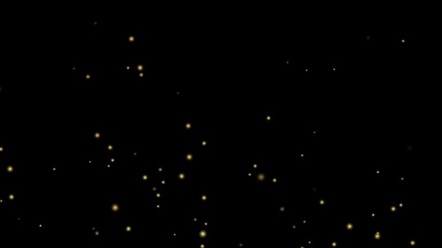 4k dust partical falling isolated black background.Golden confetti. Abstract background with golden shiny sparkling sparkles. Particles of gold dust sparkles. Flying and flickering particles of light.