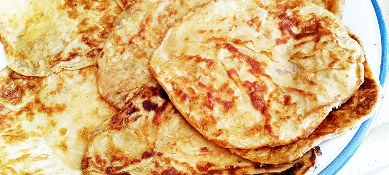 Gozleme. Traditional flat Turkish bread isolated on white background.
