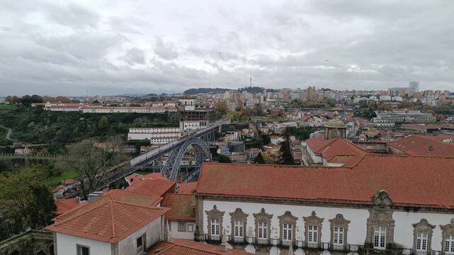 Aerial view of the Douro River and the surface metro on the Dom Lu&iacute;s I bridge between Gaia and Porto, Porto PORTUGAL