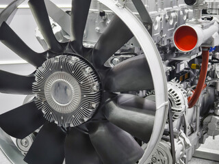 Close view of aircraft engine showing fan and metal components in mechanical workshop © OlegDoroshin