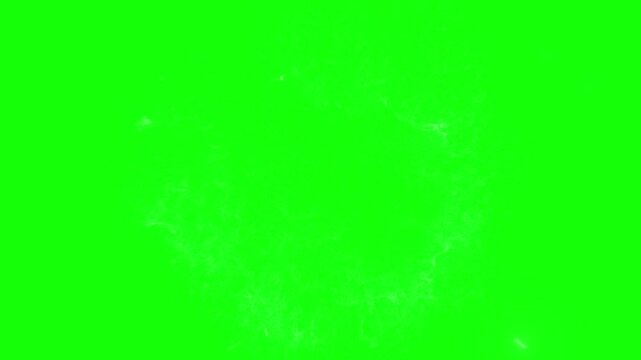 Smoke cloud billows softly against a vibrant green screen background to provide a versatile element for digital compositing and video editing projects that require atmospheric visual effects.
