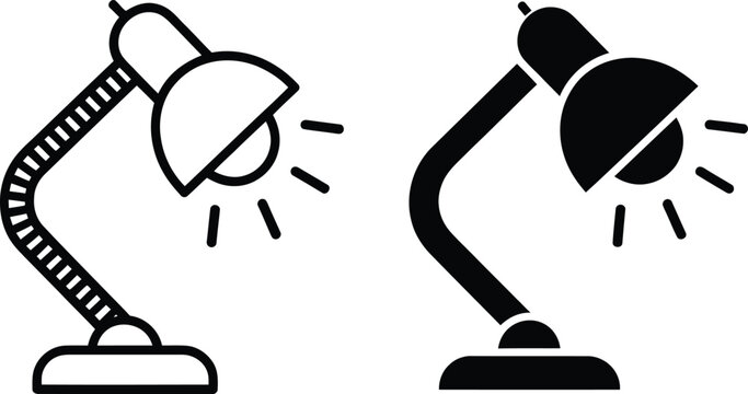 Black and white desk lamp icon with light rays