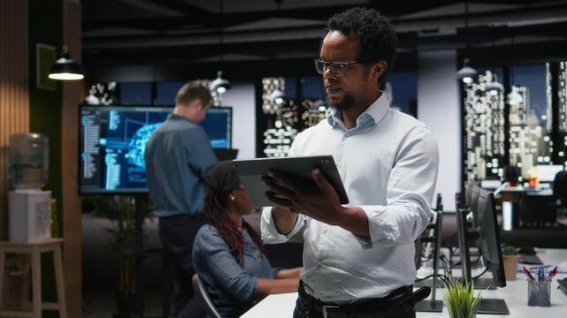 Programmer automating mobile app development tasks using AI scripts on tablet. IT professional leveraging artificial intelligence on device to accelerate feature implementation for coding workflows.