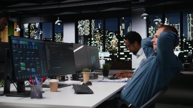 Stressed developer waiting anxiously at desk for positive result of code execution test with computer workflow for AI development workflow.