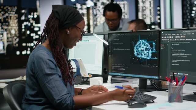 Software developer in office writing on notepad, working to fix bugs in artificial intelligence system. IT expert taking notes at desk, troubleshooting neural network errors in tech startup.