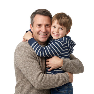 Happy father and son embracing, smiling, joyful moment, family bonding, close relationship, outdoor activity, playing, happiness, affection, childhood