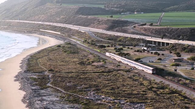 Scenic Passenger Train Ride. Amtrak Pacific Surfliner on California Coast headed North Along Pacific Ocean up the California Coast to Santa Barbara and San Francisco. West Coast USA.