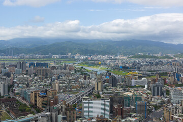 Fototapeta premium Panoramic view of taipei city with keelung river and bridges