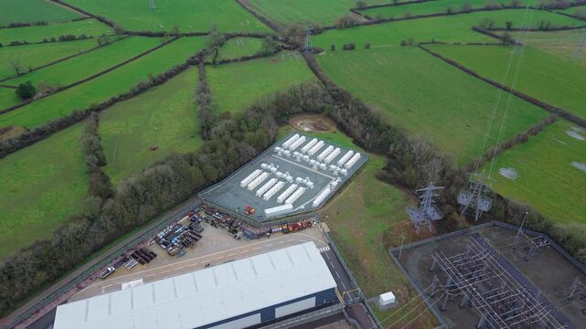 Birds eye view of modern lithium ion battery storage units at a power distribution facility in England