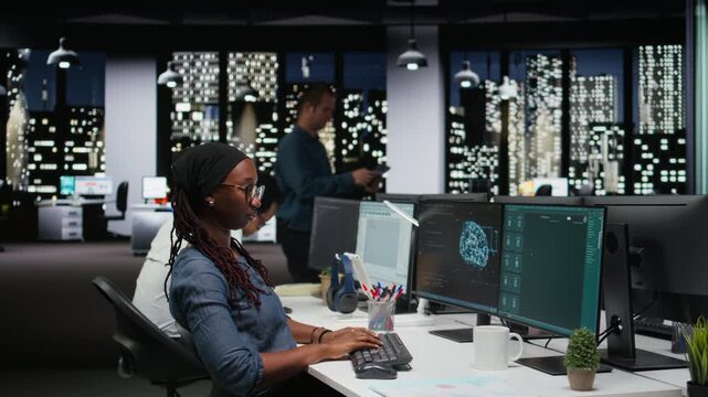 Female programmer using large language model application to get help with coding tasks. woman interacting with AI LLM chatbot PC AI chatbot software on PC.