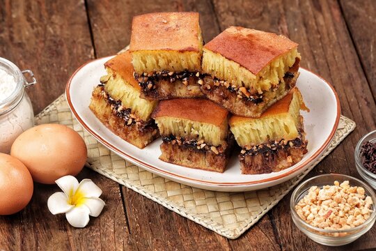 martabak manis, terang bulan, a thick sweet pancake filled with chocolate, cheese, peanuts, and condensed milk